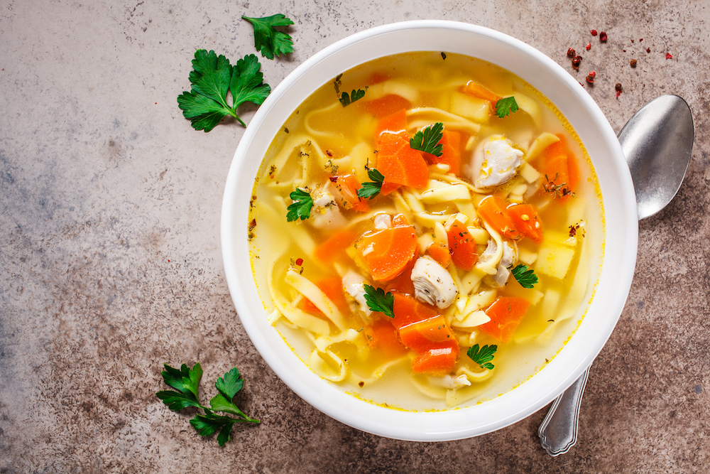 A healthy chicken noodle soup being served at the San Juan Capistrano memory care community